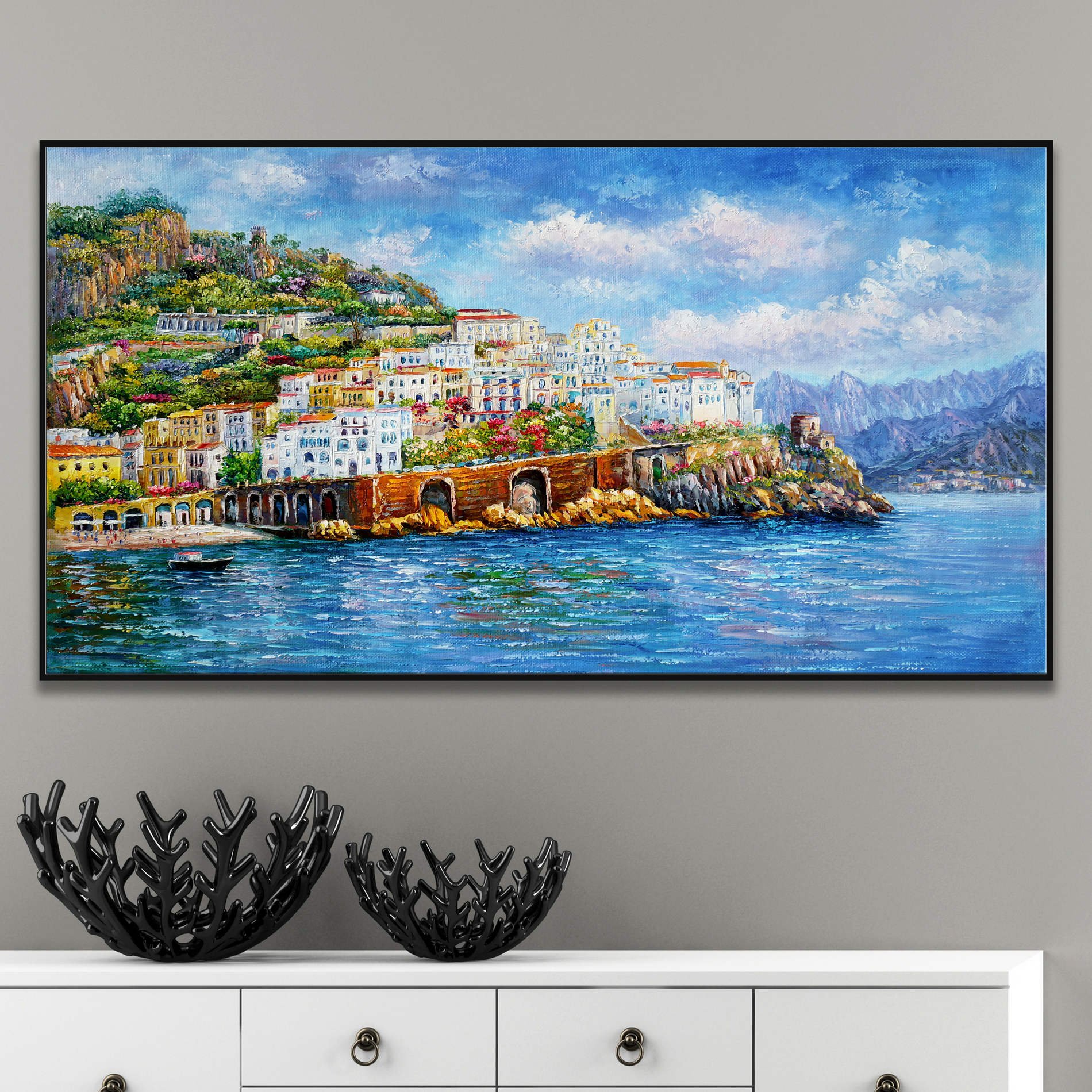 Dipinto della costiera amalfitana con gli edifici colorati di Amalfi