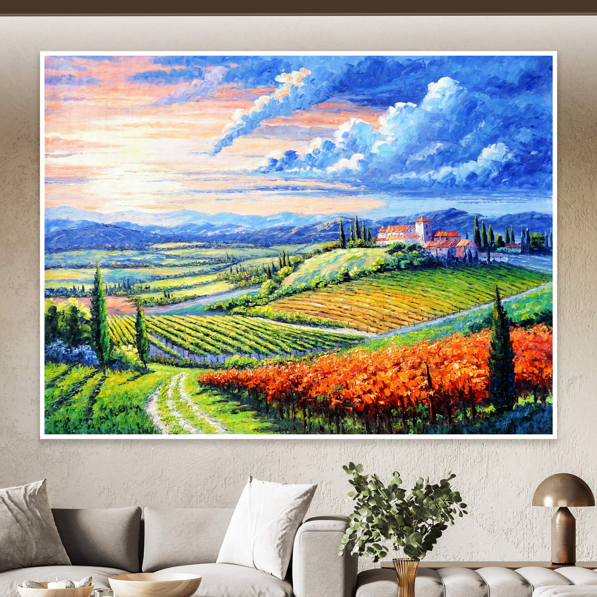 Dipinto di un paesaggio collinare al calar del sole con campi coltivati, borgo medievale e cipressi.